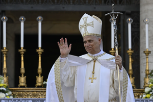 Pope Leo XIV waves to those gathered for Mass on the solemnity of Corpus Christi on Sunday, June 22, 2025, in Rome.