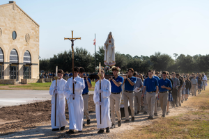 Marian procession at Frassati Catholic High School in Spring, Texas. A group of more than 50 pilgrims — students, adults, clergy, and Dominican Sisters of St. Cecilia associated with the school — had scheduled to take a tour to Italy specifically for their patron’s Aug. 3 canonization.
