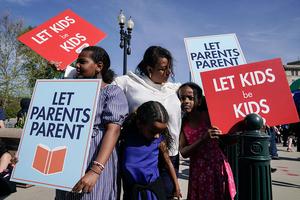 People supporting the right to opt-out their children from classes containing LGBTQ-related content demonstrated outside the US Supreme Court, as the court heard oral arguments in the Mahmoud v. Taylor case, in Washington, DC, April 22, 2025. 