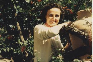 St. Gianna Beretta (Molla) radiates joy in San Vigilio, Bergamo Alta, in the garden of the home of her aunt, Piera, one of her mother’s sisters. Her then-fiancé and future husband, Pietro Molla, took this photo in spring 1955.