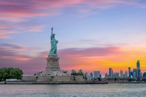 The Statue of Liberty stands in New York Harbor.
Shutterstock
