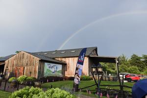 A double rainbow is seen over DC Social Collective’s fifth-annual ‘All-American Country Summer Nights’ July 12. 