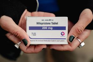 A box of mifepristone is shown outside the Supreme Court in Washington, DC, on March 26, 2024. 