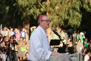 Bishop Robert Barron speaks to tens of thousands of young people at a World Youth Day gathering in Lisbon, Portugal, Aug. 2, 2023. The event, hosted by the U.S. bishops’ conference, culminated in a Eucharistic procession and Holy Hour.