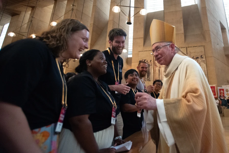 Archbishop José Gómez of Los Angeles greets perpetual pilgrims of the National Eucharistic Pilgrimage at the Cathedral of Our Lady of the Angeles in Los Angeles, California, on June 22, 2025.