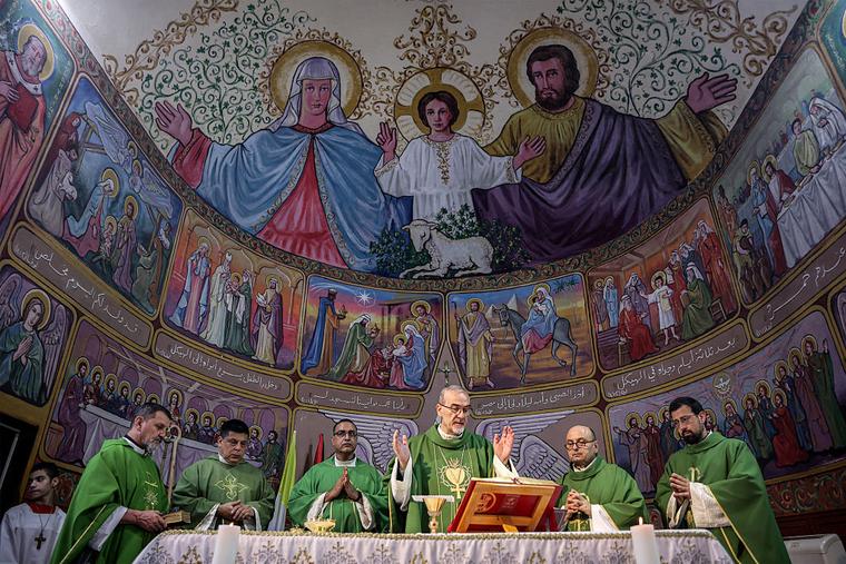 Cardinal Pierbattista Pizzaballa, Latin Patriarch of Jerusalem, leads prayers at the Sunday morning mass at the Roman Catholic Church of the Holy Family in Gaza City on July 20, 2025. 