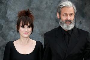 Winona Ryder and her boyfriend Scott Mackinlay Hahn attend the UK Premiere of 'Beetlejuice Beetlejuice' at Cineworld Leicester Square in London.
