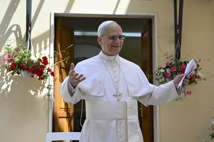 Pope Leo smiles as he arrives for a visit to the Santa Marta Retirement Home in Castel Gandolfo, Italy, on July 21, 2025.