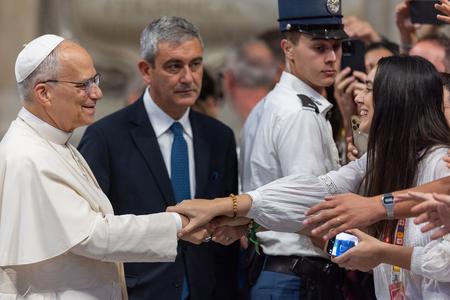 Pope Leo XIV greets pilgrims at St. Peter’s Basilica Tuesday as part of the Jubilee of Digital Missionaries and Catholic Influencers.