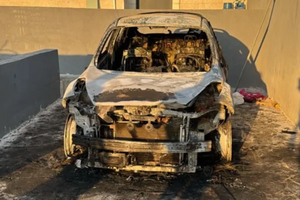 Cars were torched in an attack on the town of Taybeh in the West Bank on July 28, 2025.