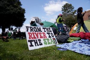 Pro-Palestinian demonstrators occupy an encampment on the campus of UCLA on April 25, 2024, in Los Angeles. 