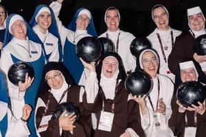Religious sisters take a picture during a bowling outing during the Napa Institute Summer Conference.