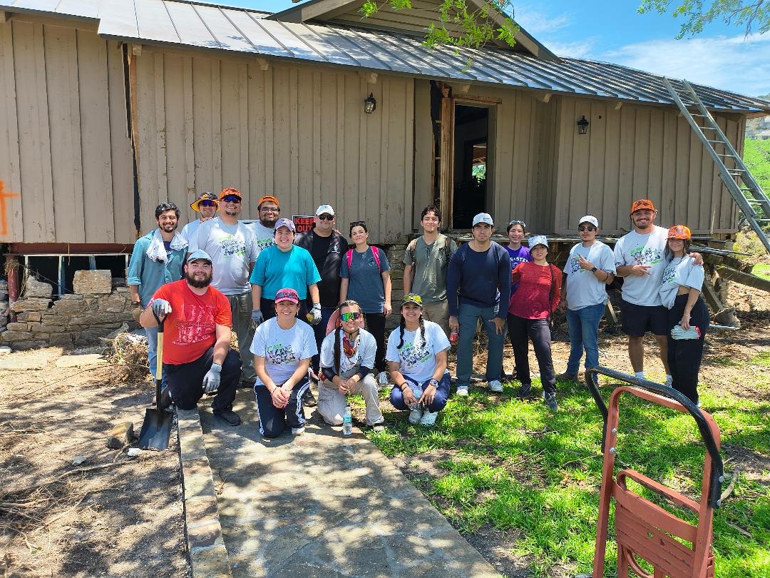 Catholic volunteers amid post-flood cleanup