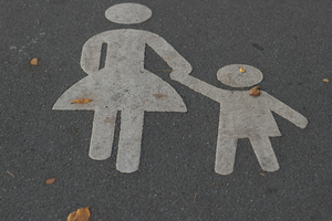 What contributes most to the well-being of children and mothers?