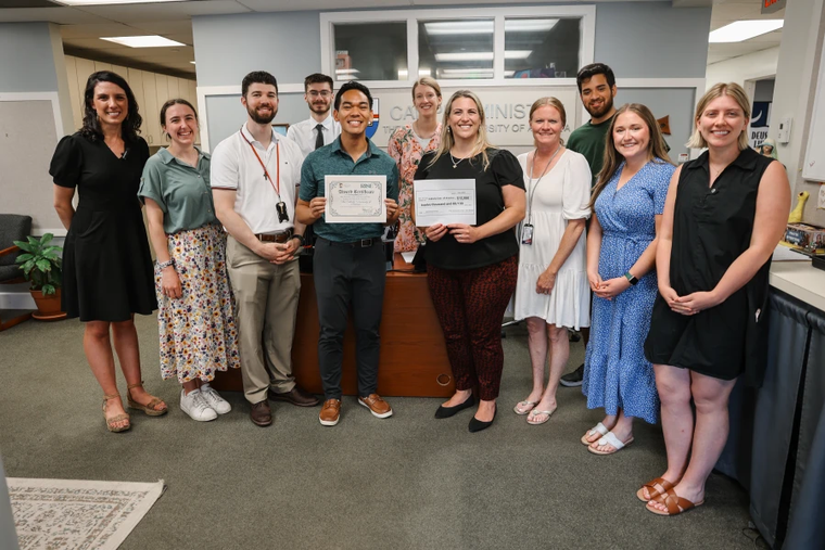 Members of The Catholic University of America Office of Campus Ministry receive their RISE Award from the Associates of St. John Bosco.