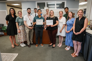 Members of The Catholic University of America Office of Campus Ministry receive their RISE Award from the Associates of St. John Bosco.