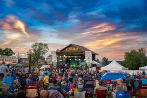Fans listen to music at sunset at a past Appaloosa Music Festival.