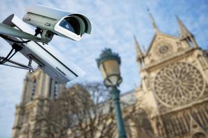 Drones, fixed cameras and facial recognition software scan public spaces, with images tied to government records.
