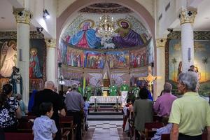 Worshippers attend a Sunday morning Mass led by Cardinal Pierbattista Pizzaballa, Latin patriarch of Jerusalem, at the Roman Catholic Church of the Holy Family in Gaza City on July 20, 2025. | Credit: OMAR AL-QATTAA/AFP via Getty Images