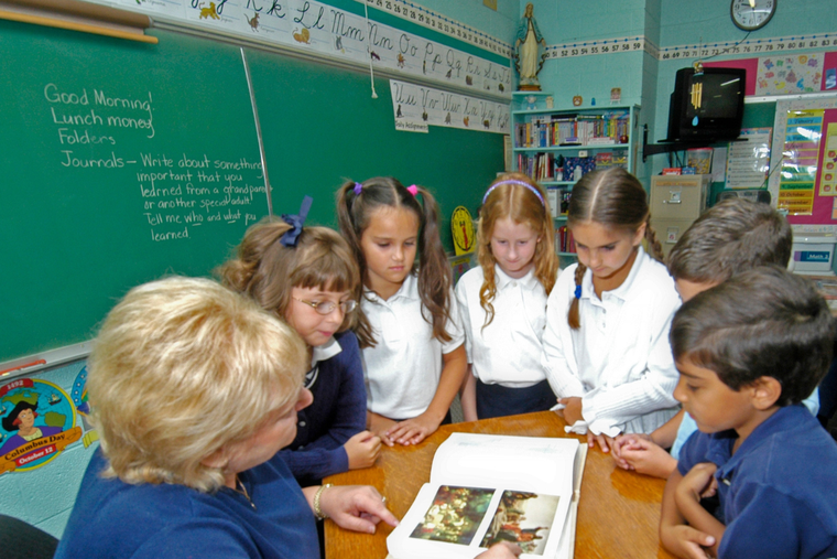 Students learn in a small group at St. Mary’s Catholic Elementary School in St. Clair, Michigan. 