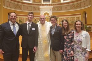New Catholics with their pastor, Easter 2024: Left to right: Daniel (Dan) Bingham, Derek Bingham, Father William (Bill) Ashbaugh, David Bingham, Elise Bingham and Hannah Bingham.