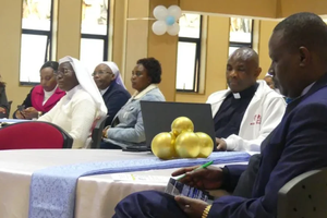 Participants gather at the Aug. 18, 2025, launch event for a new digital app that will bring together 66 Catholic radio stations in east Africa. Father Don Bosco, editor-in-chief of ACI Africa, CNA’s news partner in Africa, is pictured in the center.