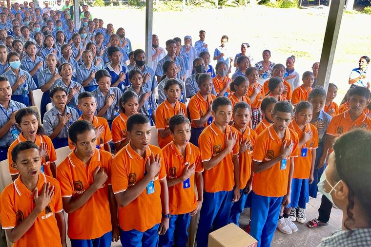  Students at Our Lady of Fatima secondary school in Railaco sing the national anthem. 