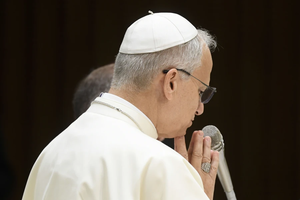 Pope Leo XIV prays during his Wednesday general audience on Aug. 13, 2025, in the Paul VI Audience Hall at the Vatican.