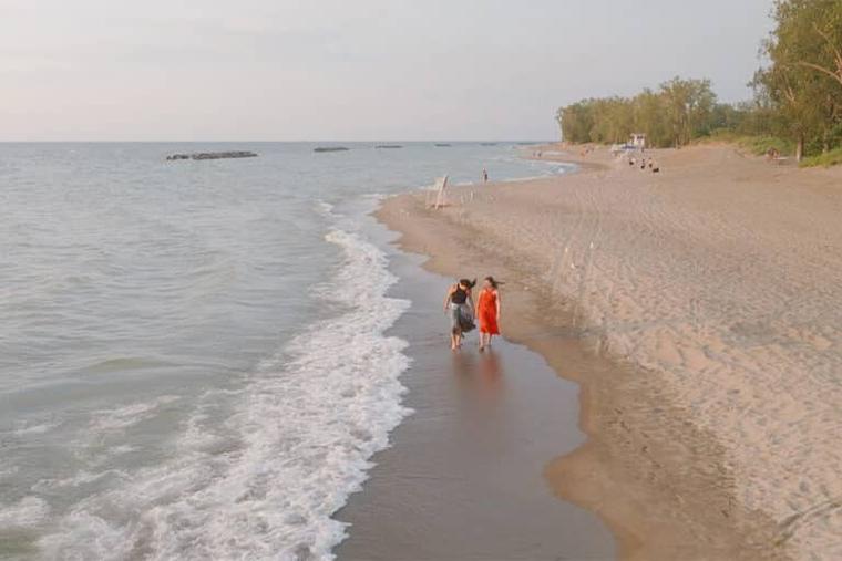 Kate Stapleton strolls the shore of Lake Michigan with her biological daughter, Brigid, in the documentary about their adoption story, ‘The Inner Sea.’