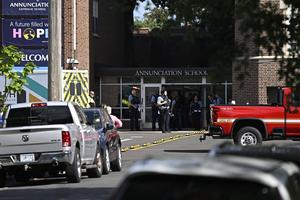 Police work the scene following a mass shooting in front of Annunciation Catholic School on Aug. 27, 2025, in Minneapolis. 