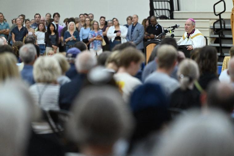 Archbishop Bernard Hebda leads a prayer vigil at Academy of Holy Angels in Richfield, Minnesota, for the victims of a mass shooting at Annunciation Catholic Church and School in Minneapolis, where two children were killed and 17 injured by a shooter on Aug. 27, 2025.      