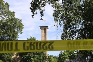Annunciation Catholic Church is seen behind police tape following a mass shooting on Aug. 27, 2025, in Minneapolis.