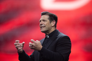 Father Mike Schmitz speaks at the revival session of the National Eucharistic Congress at Lucas Oil Stadium in Indianapolis on July 18, 2024.