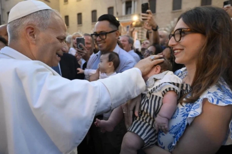 Pope Leo XIV greets the families of the Vatican
