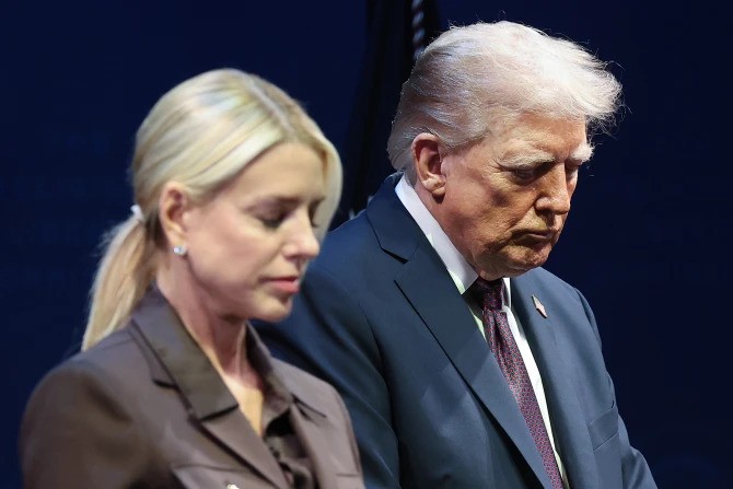 U.S. President Donald Trump bows his head in prayer with Attorney General Pam Bondi at the Museum of the Bible on Sept. 8, 2025, in Washington, D.C. Trump addressed the White House Religious Liberty Commission during the event.