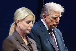 U.S. President Donald Trump bows his head in prayer with Attorney General Pam Bondi at the Museum of the Bible on Sept. 8, 2025, in Washington, D.C. Trump addressed the White House Religious Liberty Commission during the event.