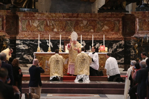 Cardinal Raymond Burke gives the final blessing after celebrating a Traditional Latin Mass at the Altar of the Chair in St. Peter’s Basilica during the third edition of the Summorum Pontificum pilgrimage in Rome on Oct. 25, 2014.