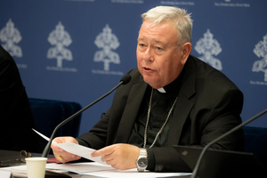 Cardinal Jean-Claude Hollerich, relator general of Synod on Synodality, speaks to the media on June 20, 2023, at the temporary headquarters of the Holy See Press Office in Vatican City.