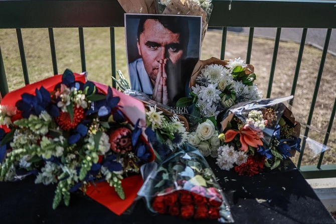 A general view of a wreath laid by mourners outside the U.S. Embassy in Pretoria on Sept. 11, 2025, following the fatal shooting of U.S. youth activist and influencer Charlie Kirk while speaking during an event at Utah Valley University in Orem, Utah. 