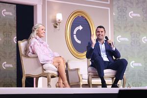 Erika and Charlie Kirk speaking together at an event in Texas in 2025. 