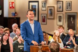 Charlie Kirk debates with students at the Cambridge Union on May 19 in Cambridge, England.