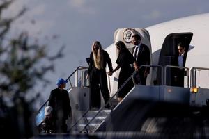 Vice President JD Vance (R) second lady Usha Vance (C) and Erika Kirk deplane Air Force Two while escorting the body of Charlie Kirk on Sept. 11, 2025 in Phoenix, Arizona.