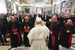 Pope Leo XIV greets participants in a seminar organized by the Pontifical Academy of Theology, at the Vatican on Sept. 13, 2025.