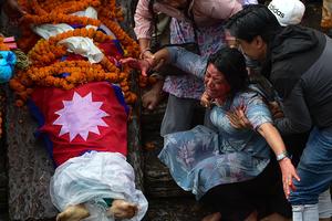 The mother of one Gen-Z protester who was shot dead during last Monday's deadly protest, mourns during a cremation ritual at Pashupatinath Temple on September 16, 2025 in Kathmandu, Nepal. Nepal has been rocked by massive youth-led protests in September 2025, triggered by anger over government corruption, nepotism, and the banning of popular social media platforms, dubbed the 'Gen-Z protests.'