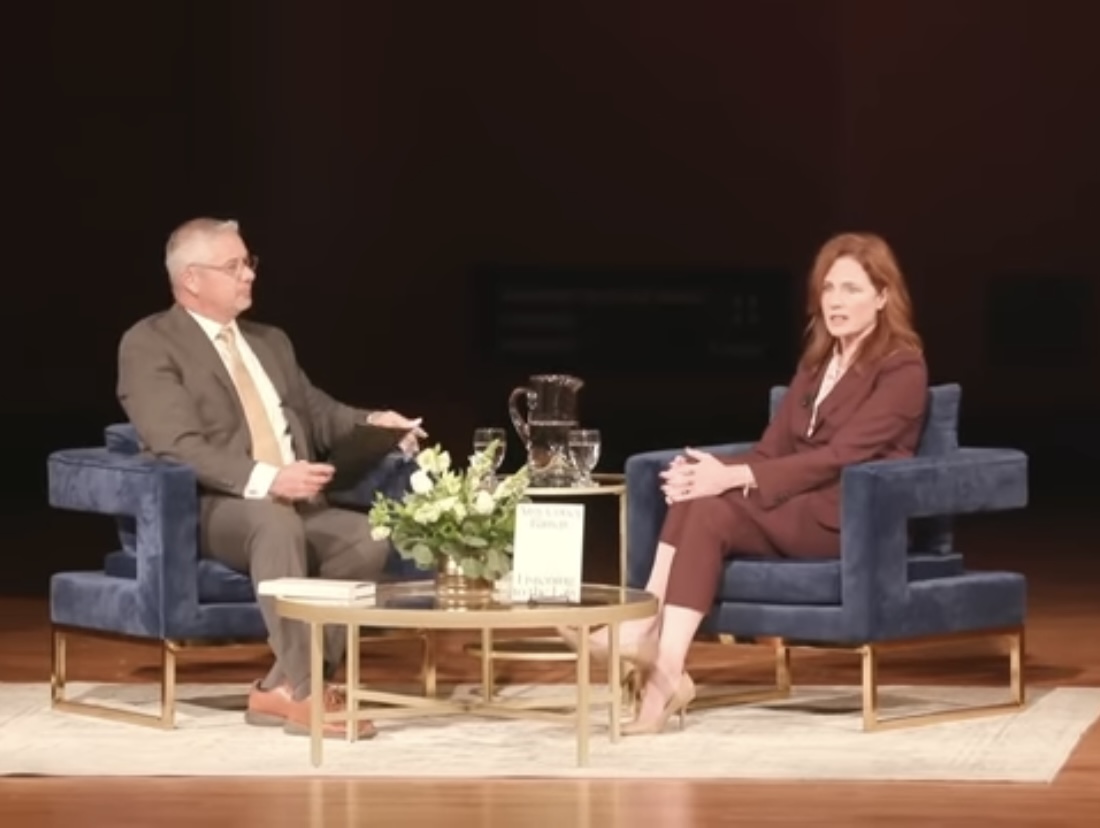 Amy Coney Barrett on stage at the University of Notre Dame discussing her new book. 