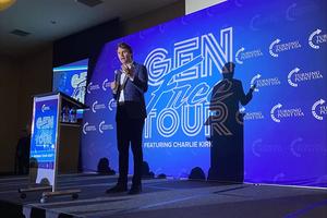 Charlie Kirk speaks on the stage at Hillsdale College in Hillsdale, Michigan.