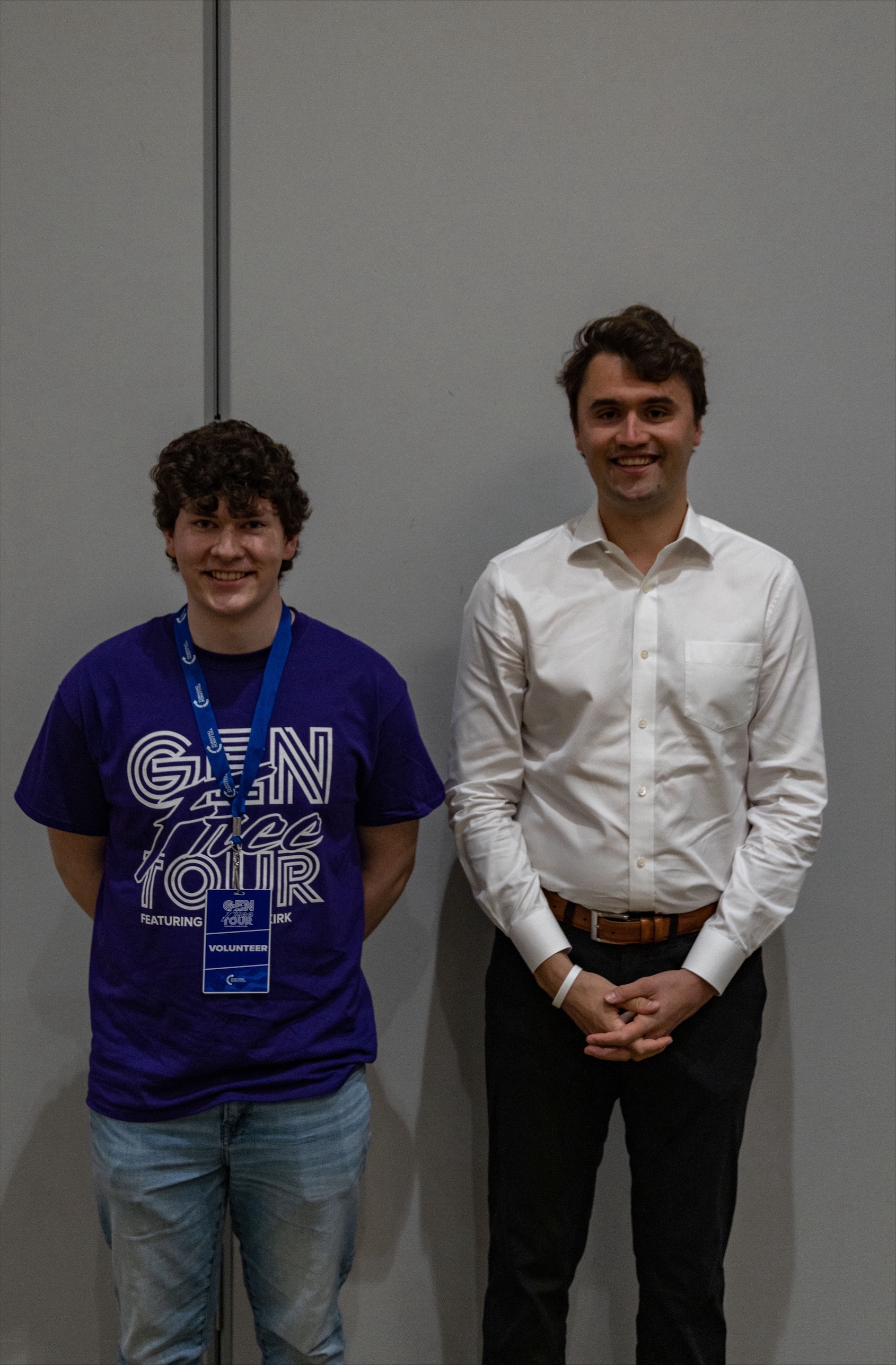 Student Will Deaton stands next to Charlie Kirk during the Gen Free Tour.