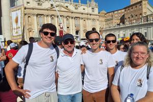 Kevin Hertelendy, middle, and other members of the Tipi Loschi pose in front of St. Peter's Basilica at the Sept. 7 canonization Mass for St. Pier Giorgio Frassati.
