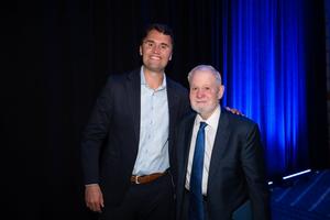 Charlie Kirk poses with Hillsdale president Larry Arnn during the National Leadership Seminar hosted by Hillsdale College at the Sheraton Phoenix Downtown in Phoenix, Ariz. on February 18, 2025.