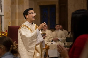 Father Linh Bui celebrating Mass.